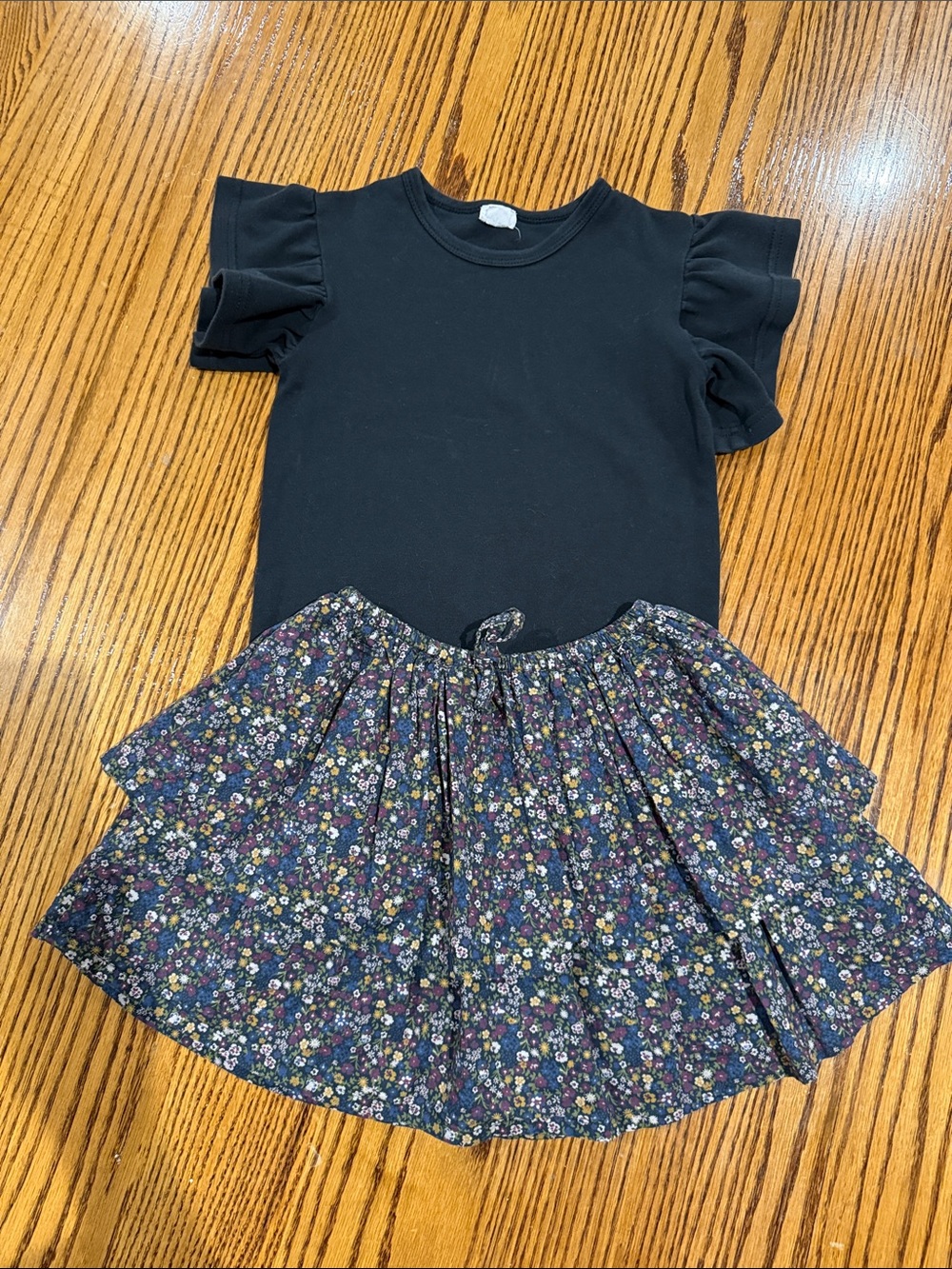Jamie Kay Black Ruffle Sleeve Top with Navy Floral Tiered Skirt